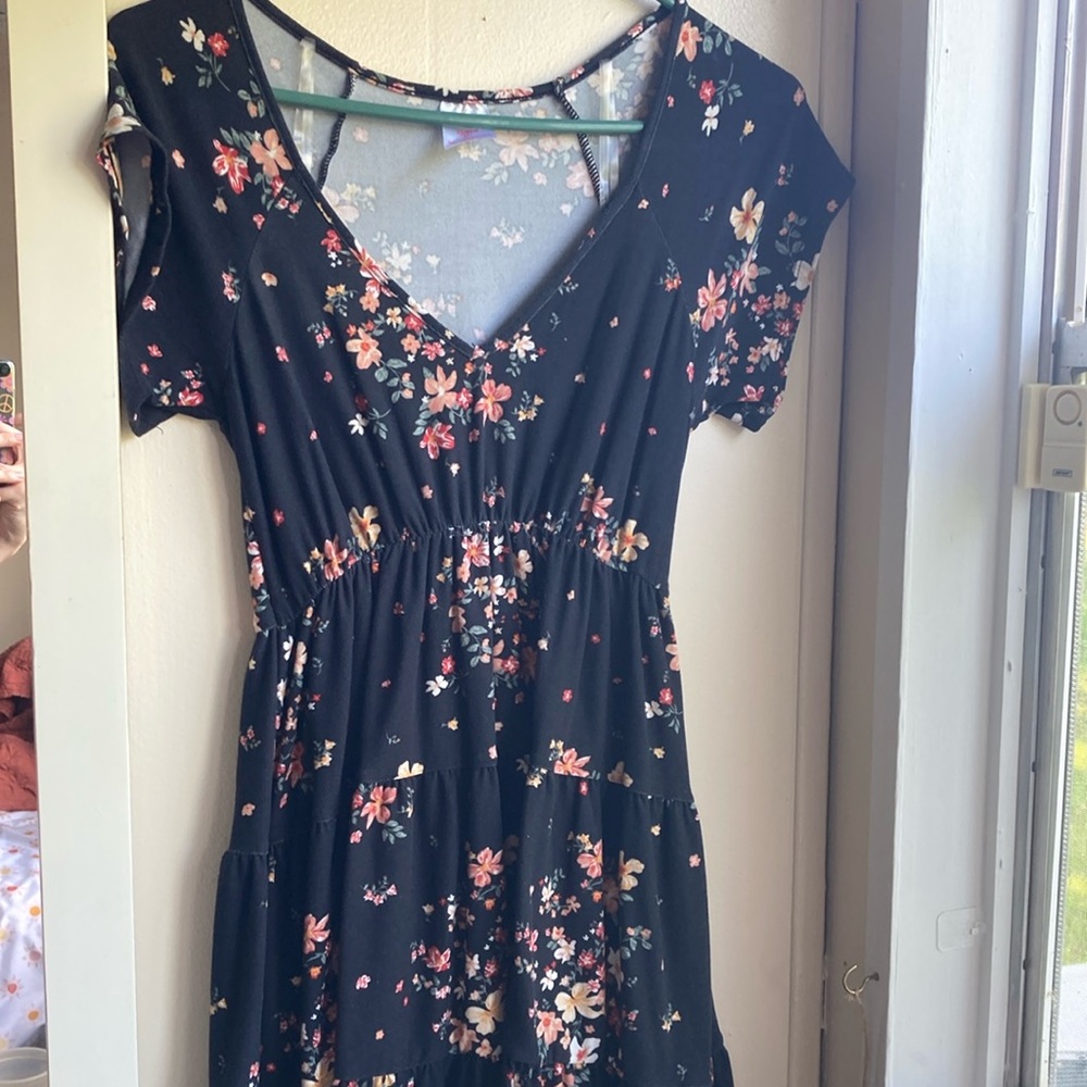 Black dress with a floral pattern